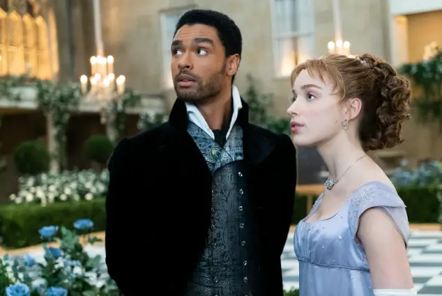 Regé-Jean Page and Phoebe Dynevor in a scene from the series 'Bridgerton'