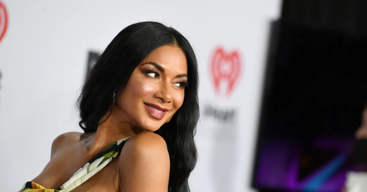 Nicole Scherzinger Shows Off Beach Body In "Cheeky" New Photos