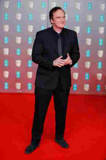 Quentin Tarantino poses on the red carpet at the BAFTAs on February 2, 2020.