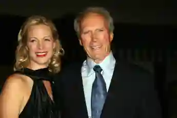 Clint Eastwood and daughter Director Alison Eastwood arrive at the premiere of Rails and Ties, 23 October 2007, in Los Angeles, California