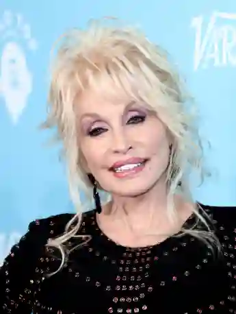 Dolly Parton Reveals The Meaning Behind Her Tattoo