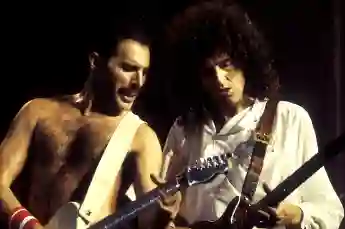 Freddie Mercury and Brian May of Queen live at a Works Tour concert at Wembley Arena. London, 09/07/1984