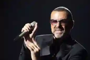George Michael performs on stage during a charity gala for the benefit of Sidaction, at the Opera Garnier in Paris, on September 9, 2012.