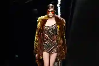 Kaia Gerber presents a creation for Versace' Women Fall - Winter 2020 fashion collection during Milan Fashion Week