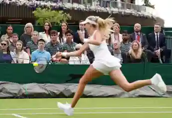 Britain's Catherine (3L), Princess of Wales, alongside former tennis players Deborah Jevans (2L) and Laura Robson (4L), watch Katie Boulter in action against Daria Saville during a tennis match at The All England Tennis Club in Wimbledon, southwest London, on the second day of the 2023 Wimbledon Championships on July 4, 2023. (Photo by Zac Goodwin / POOL / AFP) / RESTRICTED TO EDITORIAL USE (Photo by ZAC GOODWIN/POOL/AFP via Getty Images)