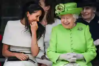 Video: Queen, Meghan Share Blanket In Moment From Oprah Interview
