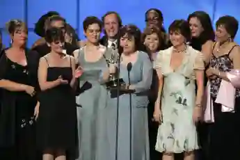 The cast of 'As The World Turns' receiving a Daytime Emmy.