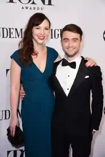 Daniel Radcliffe and Erin Darke on the red carpet in 2014