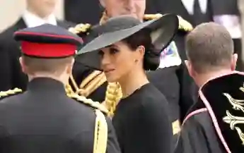 Duchess Meghan wears black and heavy make-up on the day of the Queen's funeral