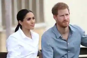 Duchess Meghan and Prince Harry sit side by side in October 2017