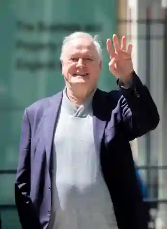 May 26, 2023, London, England, United Kingdom: JOHN CLEESE is seen leaving High Court after attending the phone hacking