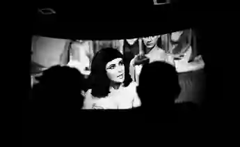 Syndication: The Tennessean A special preview audience sits enthralled on Oct. 23, 1963, by Elizabeth Taylor as a sultry