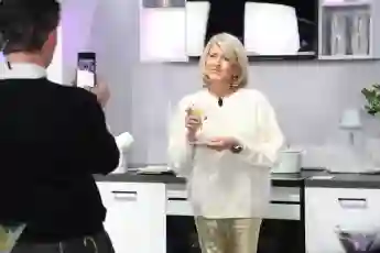 Celebrtiy chef Martha Stewart is seen taking photos with a martini glass, after a cooking demonstration at the Samsung b