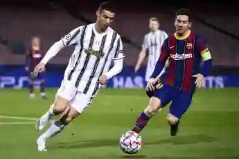 FC Barcelona, Barca v Juventus FC: Group G - UEFA Champions League Cristiano Ronaldo (L) of Juventus FC is challenged b