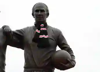 Sir Bobby Charlton Tributes - Old Trafford A general view of the statue of Sir Bobby Charlton decorated with a scarf at