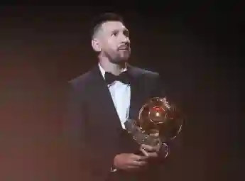 (231031) -- PARIS, Oct. 31, 2023 -- Argentine forward Lionel Messi reacts on stage with his trophy as he receives his 8t