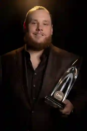 Syndication: The Tennessean Luke Combs stands backstage holding his CMA award for Single of the Year, at Bridgestone Are