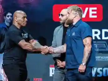 May 13, 2024, New York, New York, USA: MIKE TYSON and JAKE PAUL shake hands at the Apollo Theater press conference, PK,