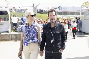 Hermsdorf: Moto GP Sachsenring 2024 on July, 6, 2024, (Photo by Juergen Tap) Keanu Reeves und Freundin Alexandra Grant v