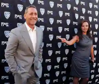 Actors and husband and wife Angelo Pagan (L) and Leah Remini attend FOX Sports/PAC-10 Conference Hollywood premiere nigh