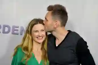 Joel McHale and Sarah Williams