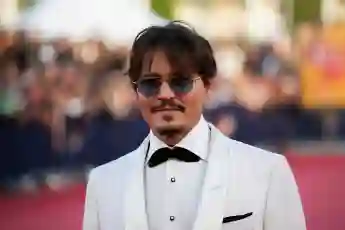 ohnny Depp poses on the red carpet as he arrives for the screening of the movie "Waiting for the Barbarians" at the 45th Deauville US Film Festival on September 8, 2019.