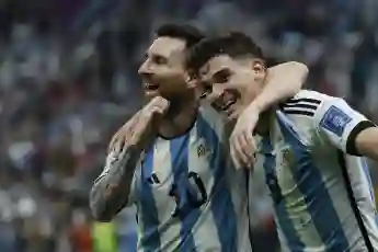 Lionel Messi and Julian Alvarez