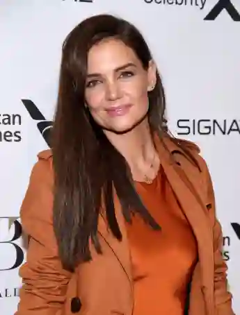 Katie Holmes talked about her life with daughter Suri and how the "grew up together".