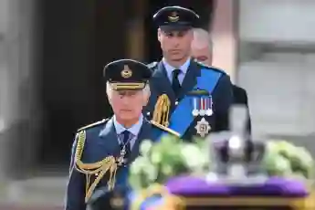 King Charles III and Prince William at the Queen's funeral procession