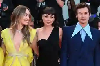 Olivia Wilde, Sydney Chandler and Harry Styles make their first red carpet appearance together in Venice