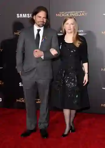 Screenwriter Peter Craig and author Suzanne Collins at the 2015 premiere of Mockingjay: Part 2.