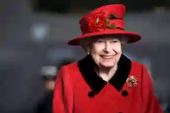 Queen Elizabeth II reacts during her visit to the aircraft carrier HMS Queen Elizabeth in Portsmouth, southern England on May 22, 2021.