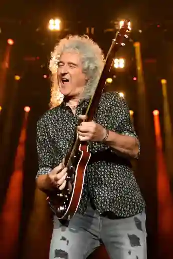 Queen's Brian May Is Hospitalized For "Over-Enthusiastic Gardening" That Led To A Butt Injury