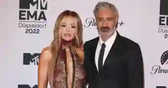 Rita Ora and Taika Waititi arm in arm at an event in November 2022