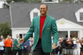 22 years after his first win at Augusta National, Tiger Woods wears the winning Green Jacket for the fifth time.