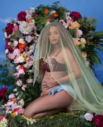 Beyonce announces her pregnancy on Instagram.