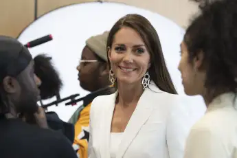 Duchess Kate surprises new outfit latest appearance Meghan Markle style inspiration royal family fashion