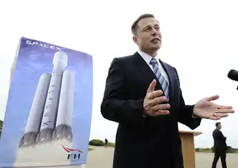 Elon Musk speaking at a 2011 SpaceX Press conference