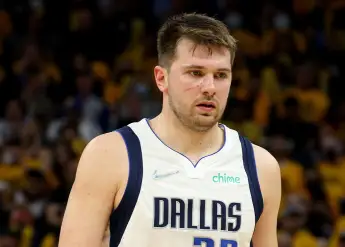Luka Dončić face scratched Andrew Wiggins Mavericks Warriors NBA Playoffs 2022