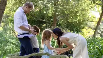 Prince Harry and Meghan Markle with their children