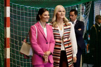 Princess Victoria and Princess Mette-Marit performing girlfriends