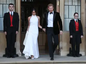 The Meaning Of Meghan Markle's Royal Wedding Reception Dress