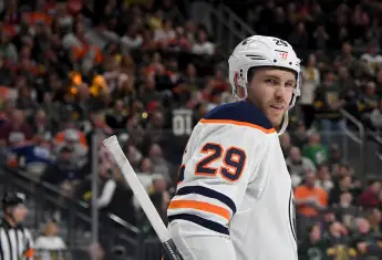 Why does Leon Draisaitl wear 29 jersey number Edmonton Oilers story Ben Thomson father Peter Draisaitl coach favourite player Germany NHL