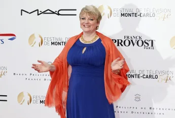 Our Little Farm star Alison Arngrim in a long blue dress