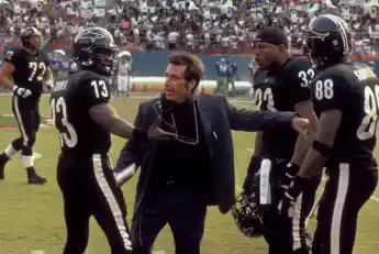 Film Still from Any Given Sunday Jamie Fox Al Pacino LL Cool J © 1999 Warner Photo Credit Robert