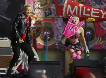 Billy Idol and Miley Cyrus during the Tik Tok Tailgate party prior to Super Bowl LV at Raymond James Stadium in Tampa, Fla. on Sunday, February 7, 2021.