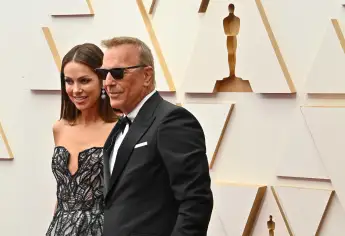 Christine Baumgartner and Kevin Costner