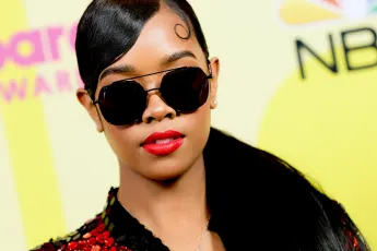 The Woman Behind H.E.R.