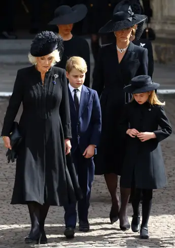 Queen Camilla, Duchess Kate, Prince George and Princess Charlotte at the funeral