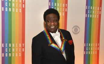 2014 Kennedy Center Honoree soul singer and Baptist Minister Al Green poses for photographers on the